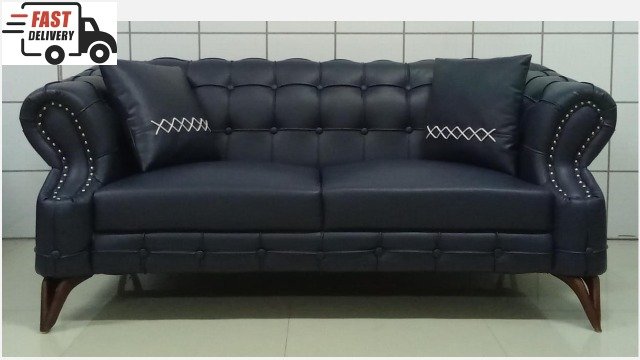 Vivaldi 2 Seater Chester faux leather sofa with turned legs, contrast stitching, and plush comfort.